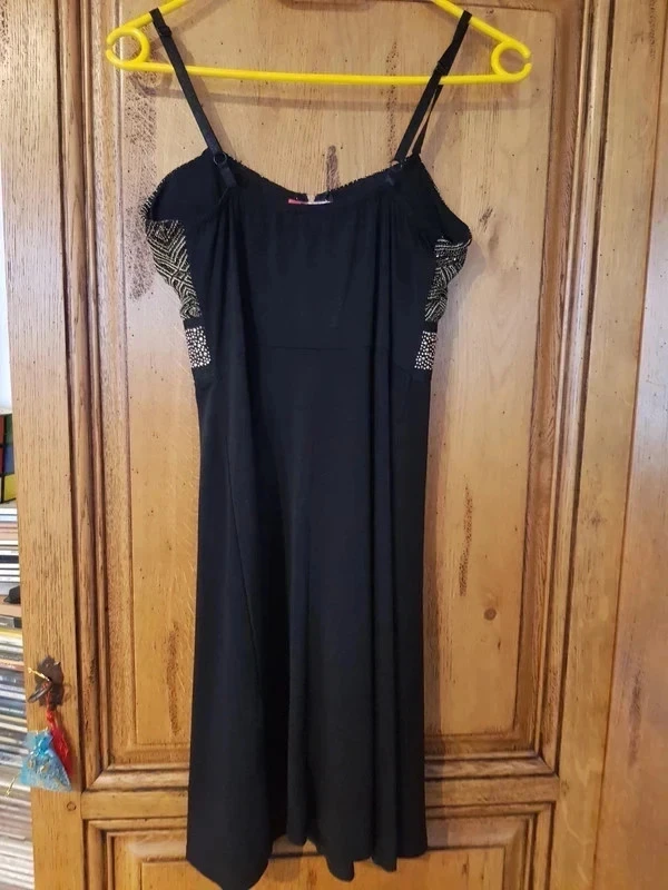 New black dress with golden rhinestones on the chest – photo 4
